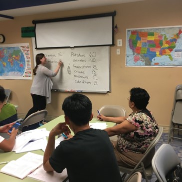 teacher in classroom with students